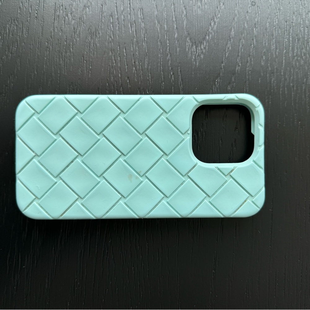 iPhone 13 Pro Bottega phone case in pale blue.